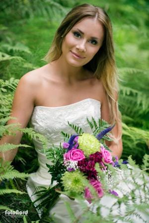 bride in a green forest