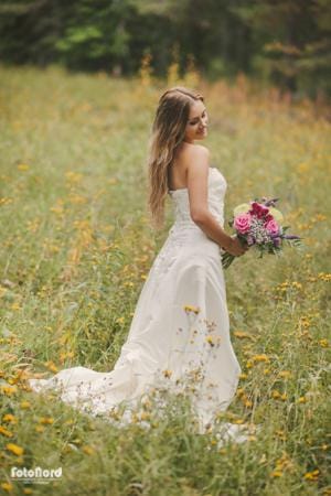 a beautiful bride in her wedding dress