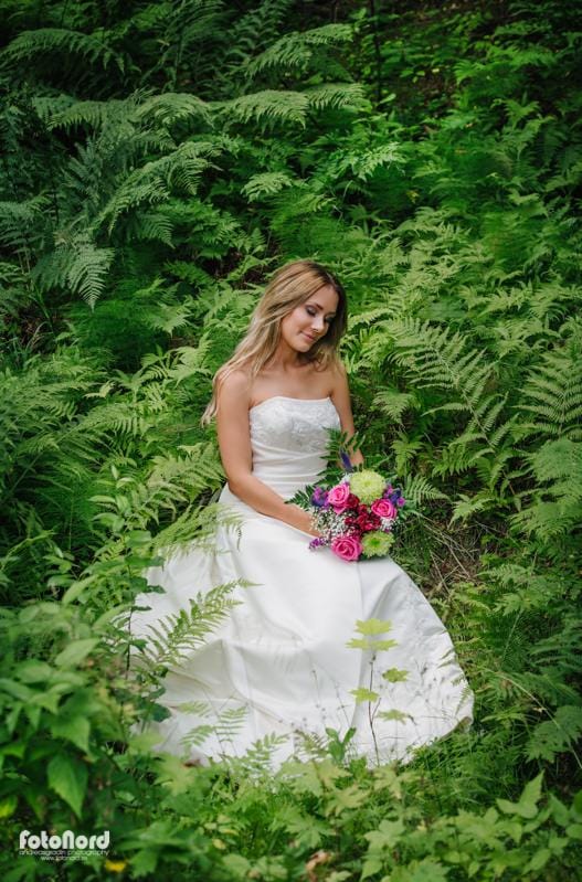 bride in a green forest
